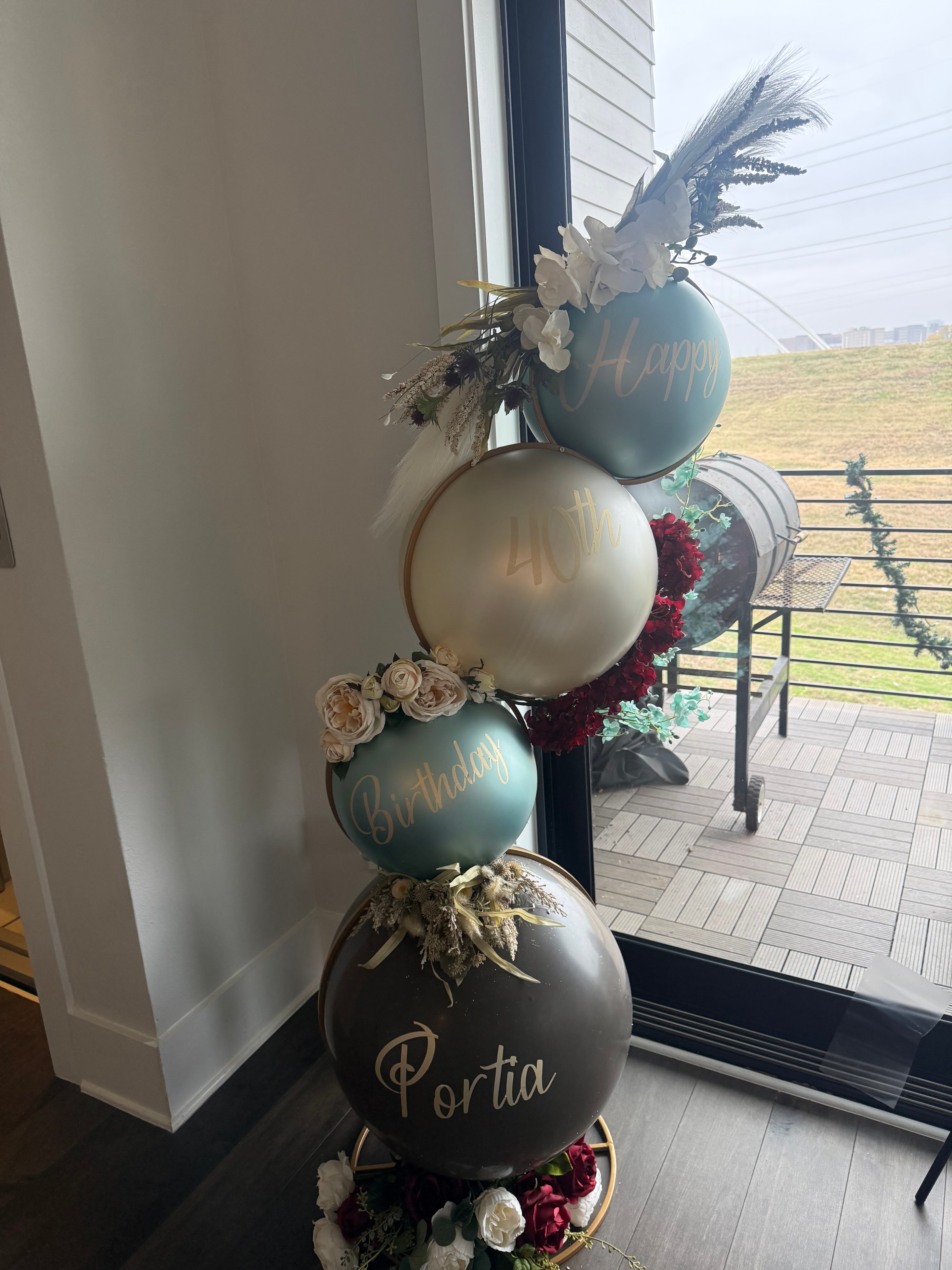 Balloon and floral birthday decoration
